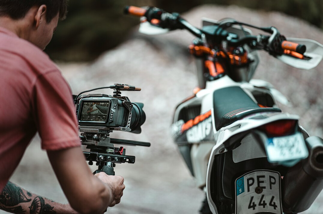 Cinema-style broadcast camera rig with follow focus and monitor